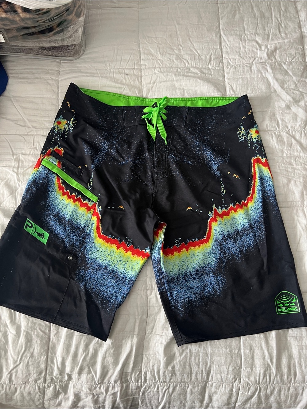 Pelagic Black Swim Board Shorts with Neon Green, Red & Blue Accents
